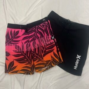 Lot of 2 mens Hurley swim trunks.  Waist size 28.  Excellent Condition